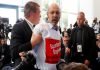 Turkish journalist expelled from Erdoğan-Merkel news conference due to slogan T-shirt