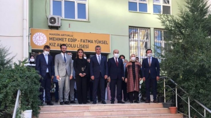 Spano posing with members of Turkey's ruling party