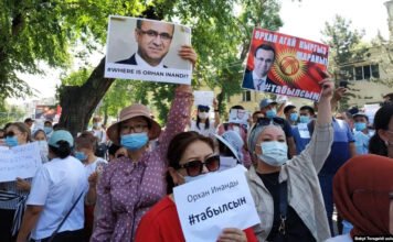 Kyrgyz hold vigil in hope of finding missing educator