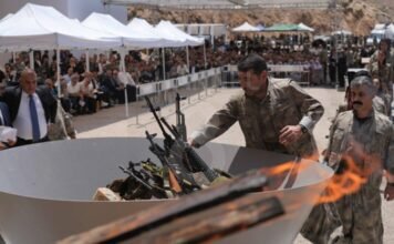 Kurdish PKK militants burn their weapons at symbolic ceremony in Iraq
