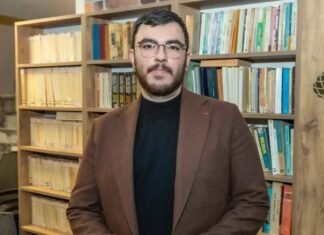 Jailed Turkish journalist faces new criminal case over reposted news report