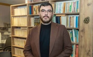 Jailed Turkish journalist faces new criminal case over reposted news report